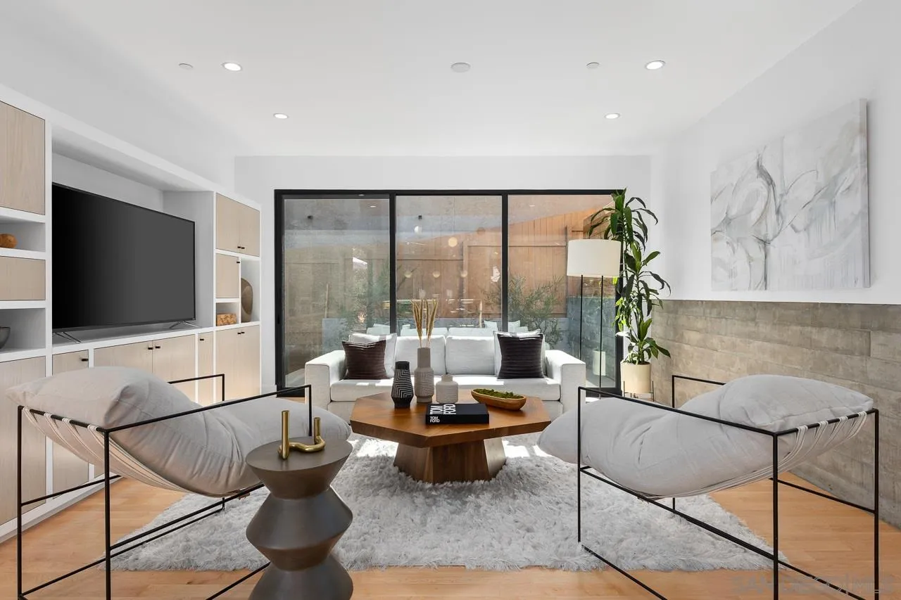 605 Cornish Drive Encinitas, CA 92024 - Photo 11 of 32 a living room with furniture and a flat screen tv