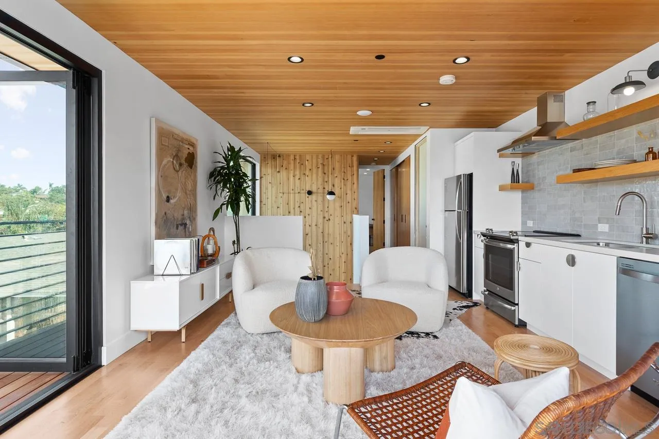 605 Cornish Drive Encinitas, CA 92024 - Photo 29 of 32 a living room with furniture and a table