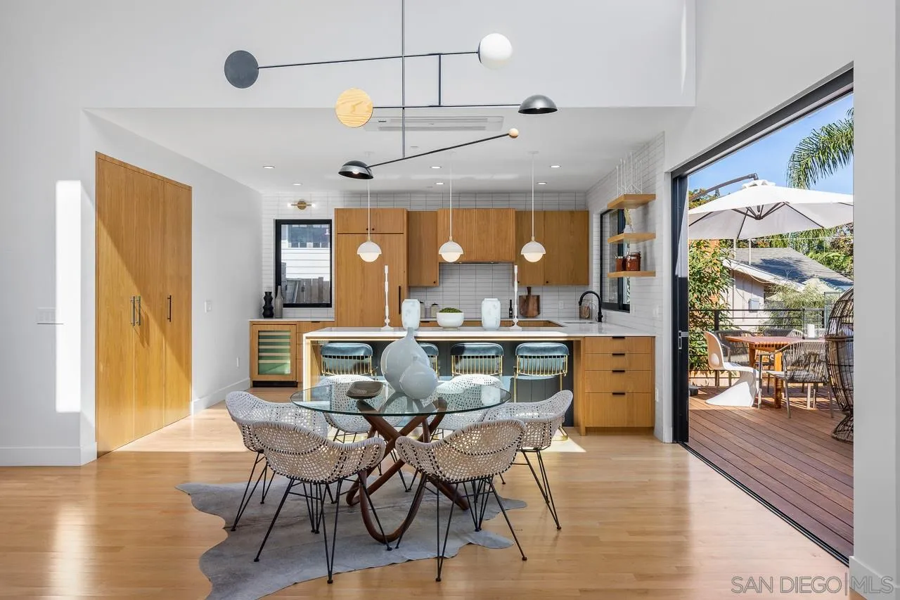 605 Cornish Drive Encinitas, CA 92024 - Photo 5 of 32 a view of a dining room with furniture window and wooden floor