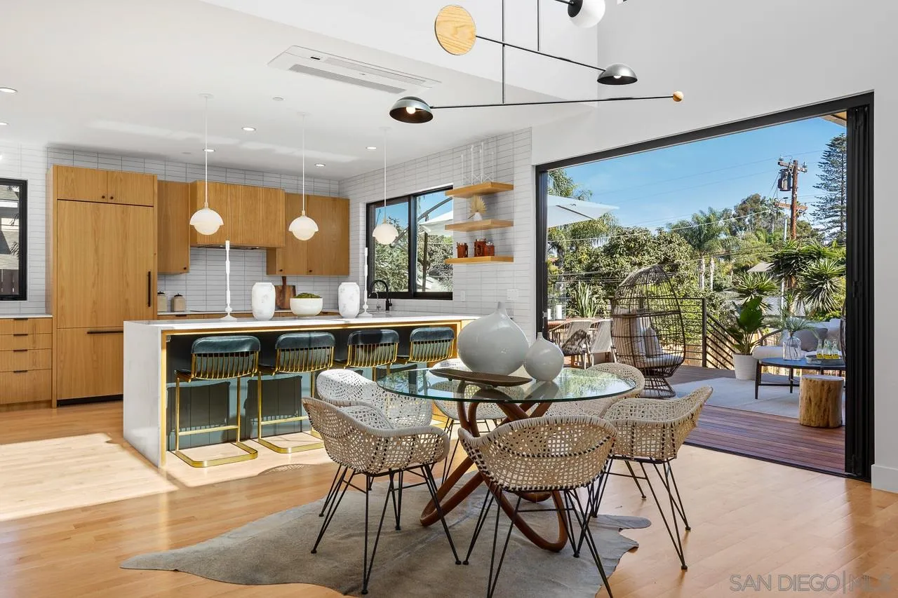 605 Cornish Drive Encinitas, CA 92024 - Photo 9 of 32 a dining room with furniture and wooden floor