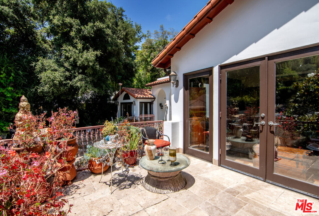 1260 Roscomare Road Los Angeles, CA 90077 - Photo 35 of 75 a front view of a house with a porch and livingroom