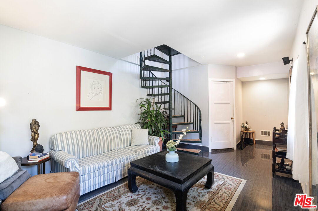1260 Roscomare Road Los Angeles, CA 90077 - Photo 65 of 75 a living room with furniture