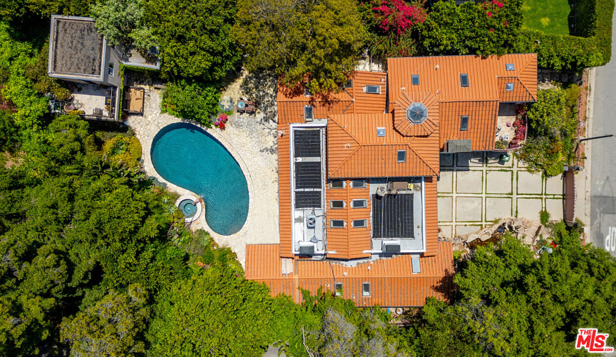 1260 Roscomare Road Los Angeles, CA 90077 - Photo 71 of 75 an aerial view of a house with a swimming pool