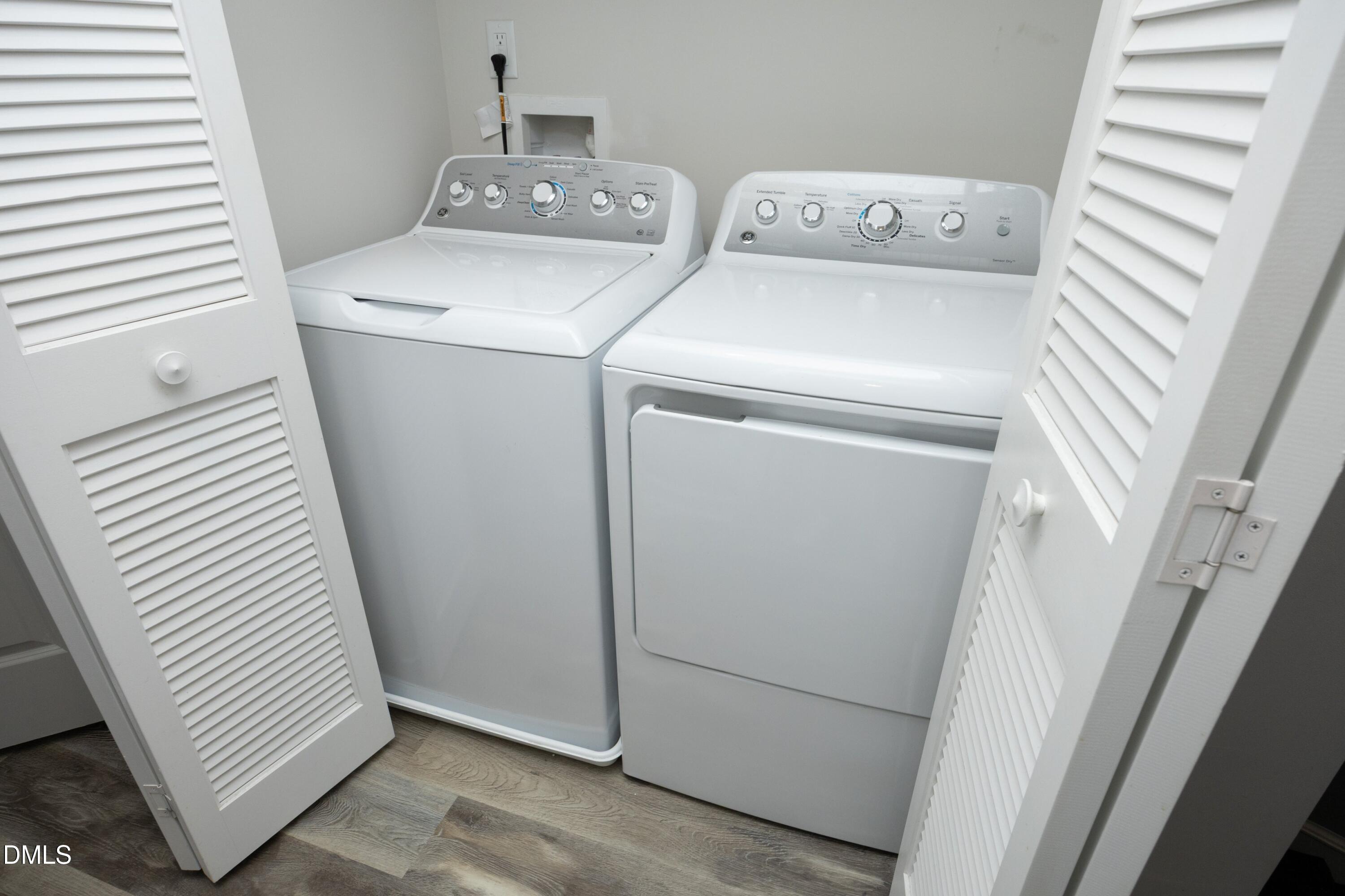 8716 Red Canyon Way Raleigh, NC 27616 - Photo 25 of 36 a utility room with dryer and washer