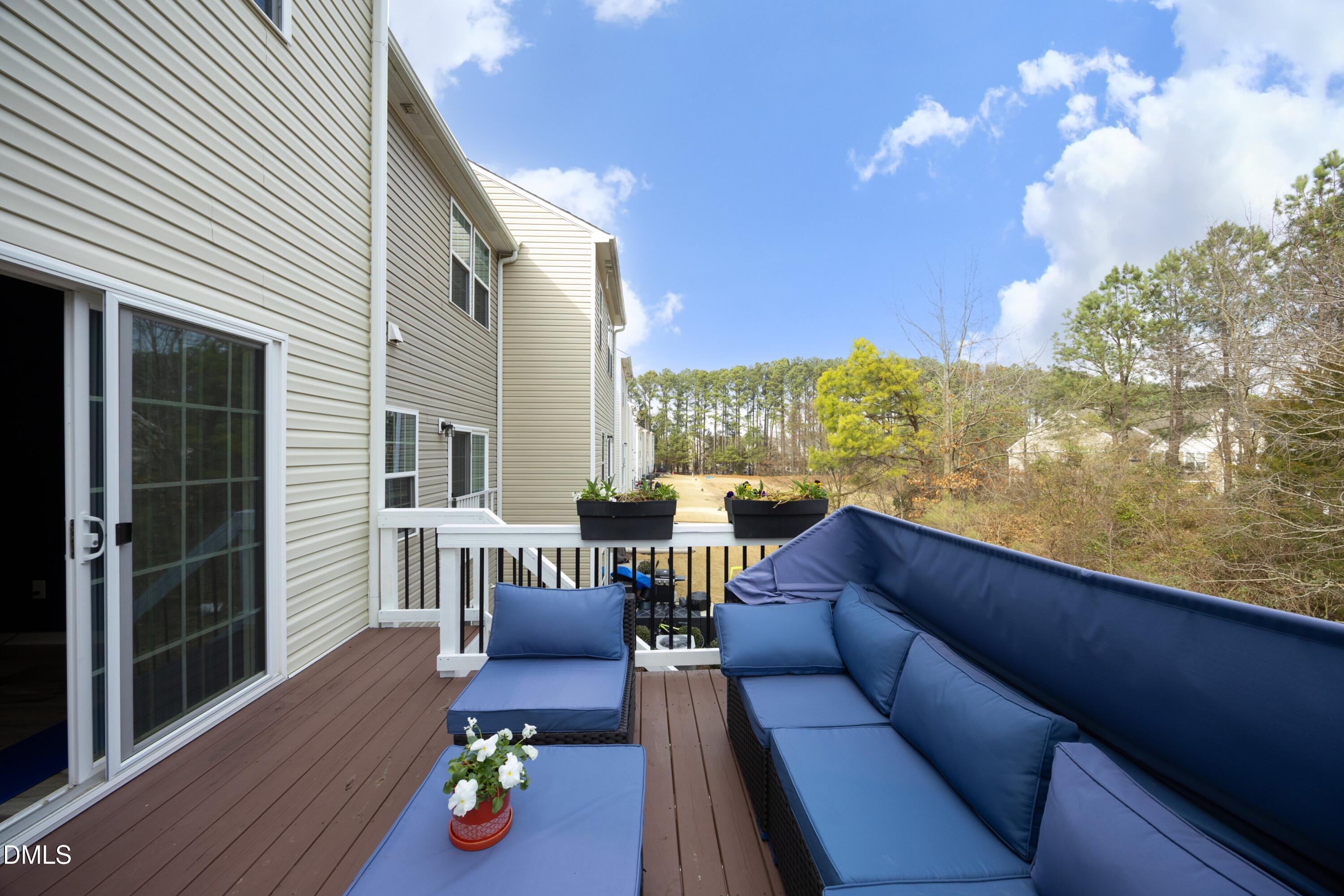8716 Red Canyon Way Raleigh, NC 27616 - Photo 26 of 36 a living room with furniture and a wooden floor