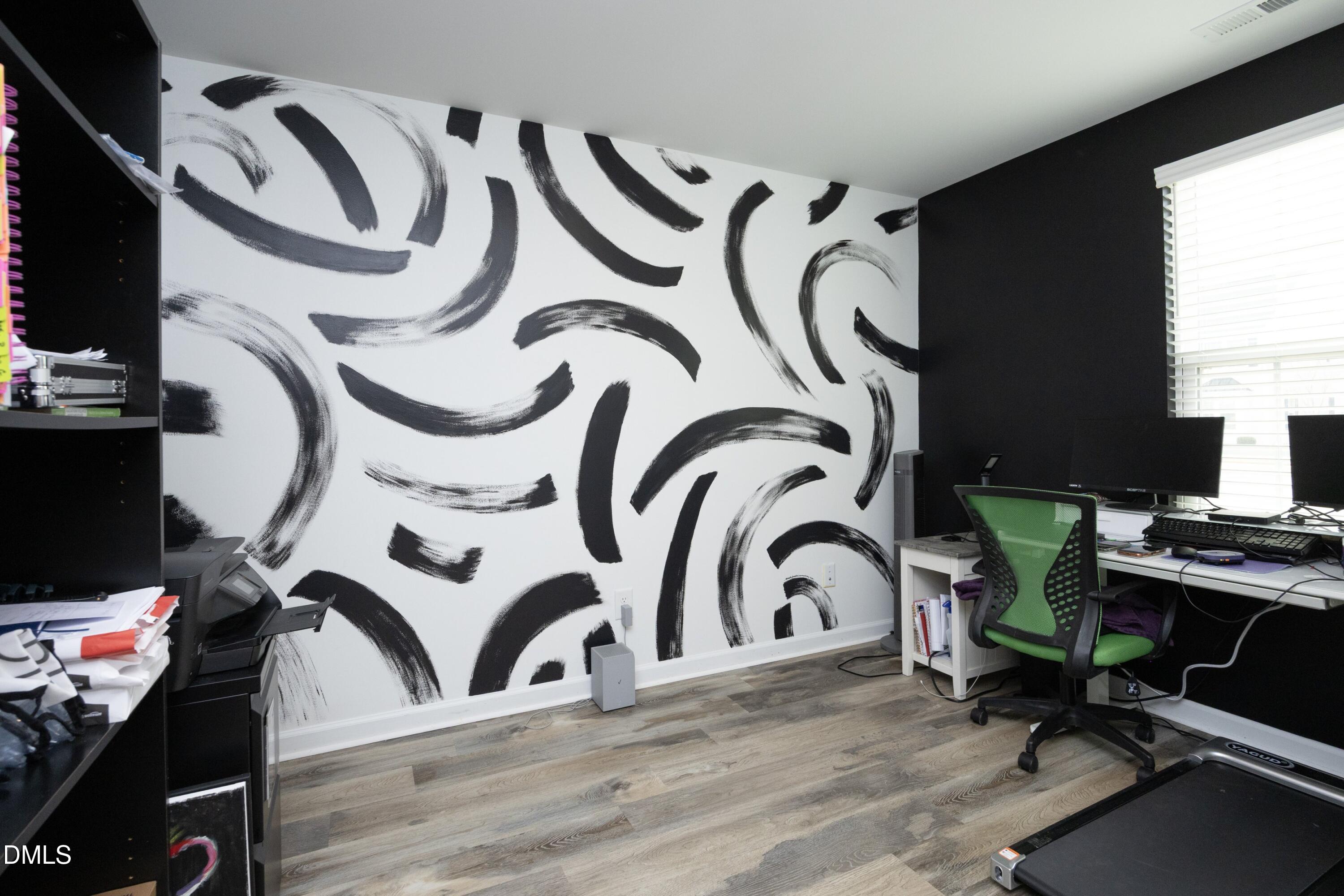 8716 Red Canyon Way Raleigh, NC 27616 - Photo 7 of 36 a view of a room with gym equipment