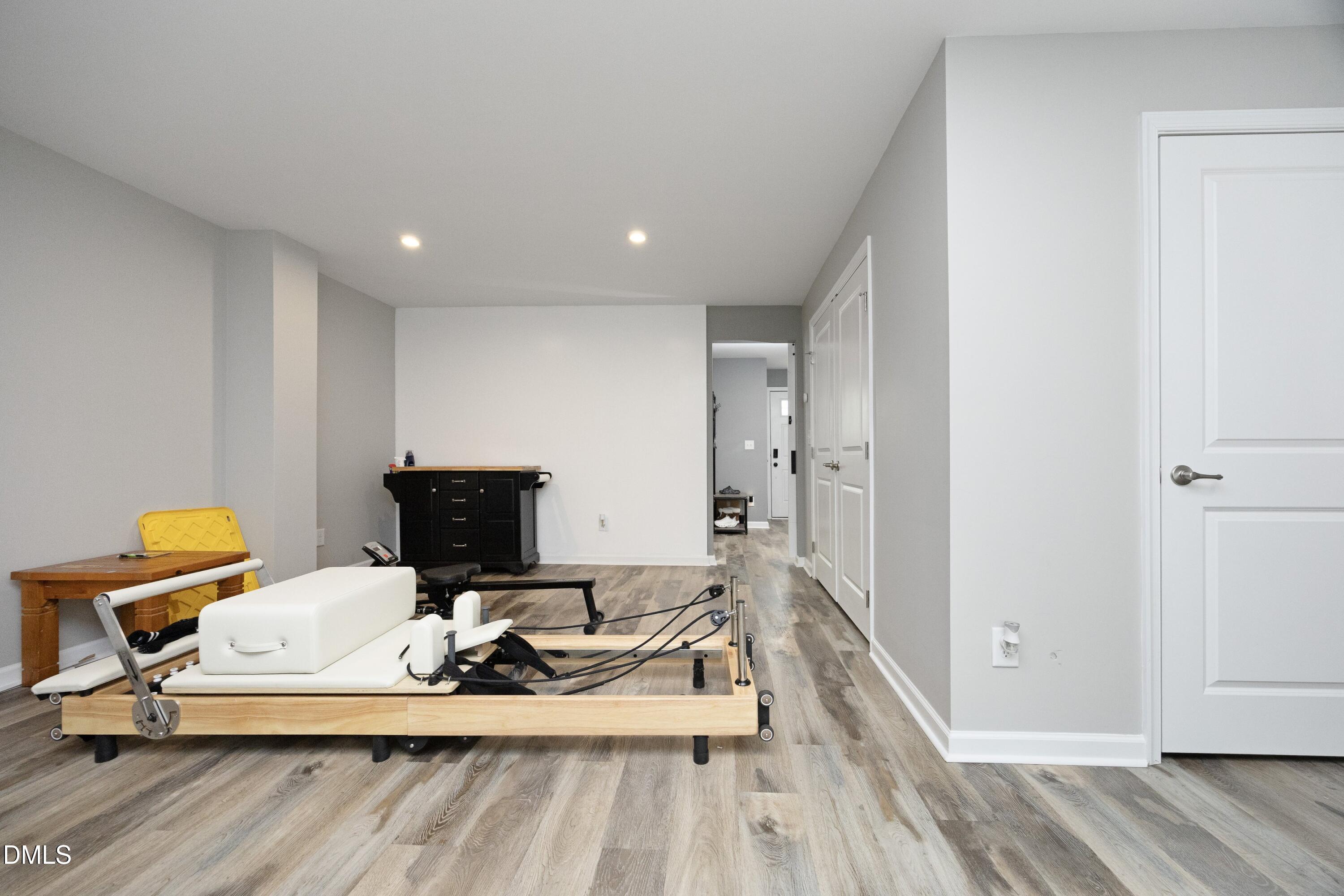 8716 Red Canyon Way Raleigh, NC 27616 - Photo 9 of 36 a living room with furniture and a wooden floor