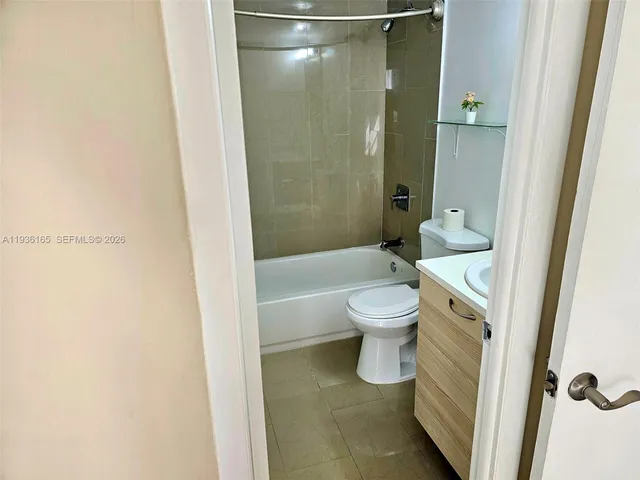 a view of hallway with windows