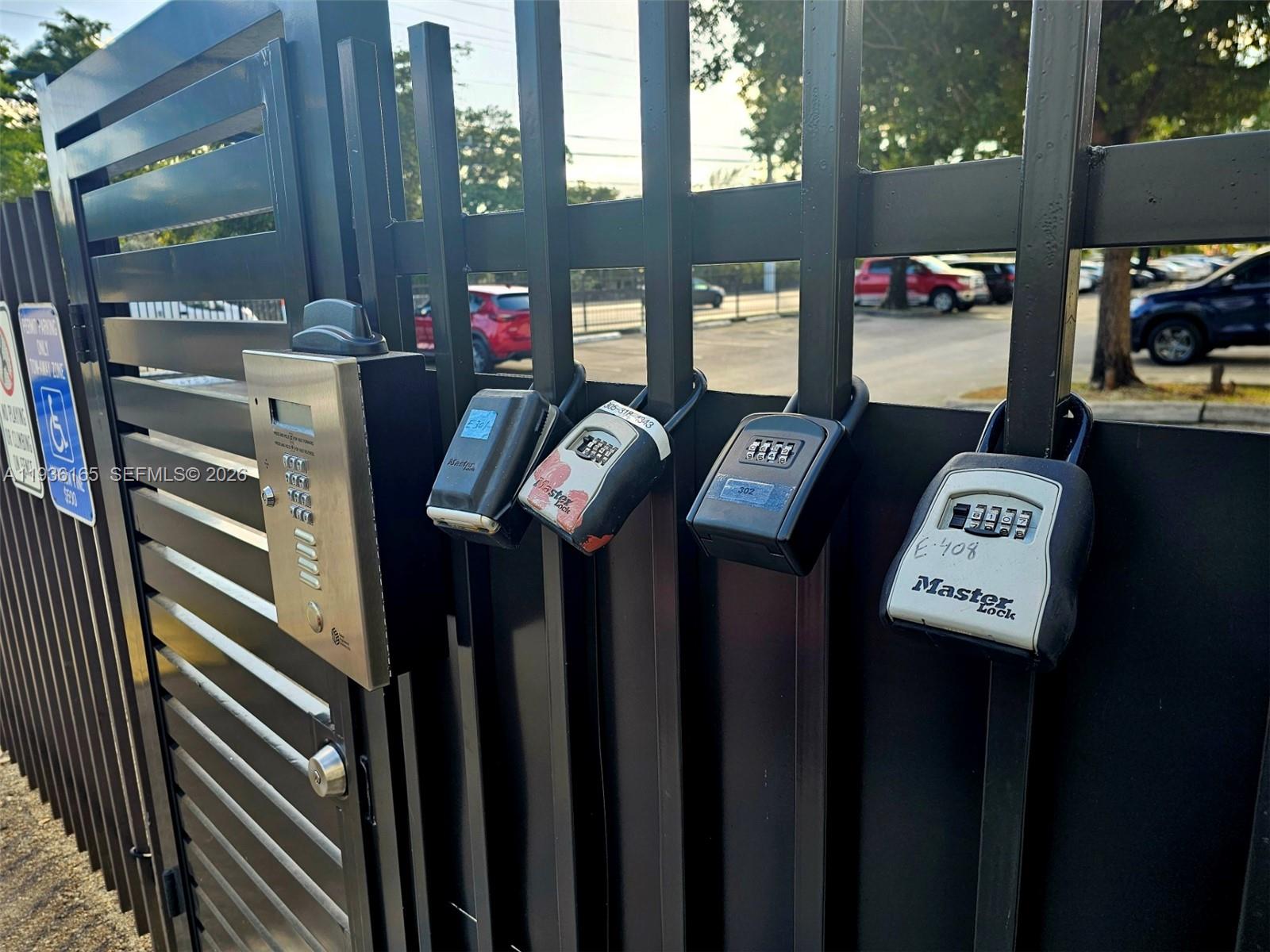 5501 Northwest 7th Street, Unit E302 Miami, FL 33126 - Photo 17 of 17 a view of a hallway with elevator