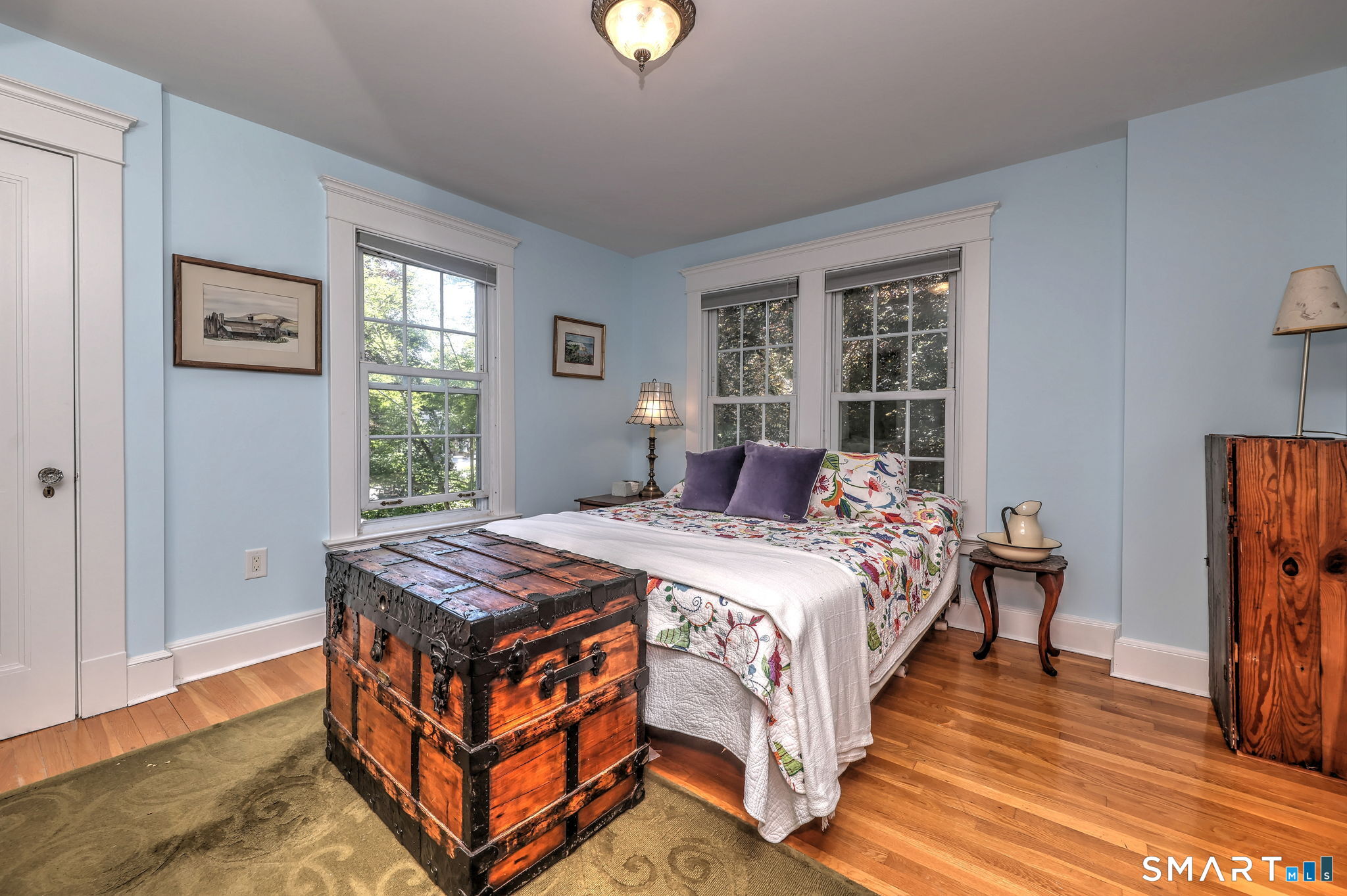 25 Center Road Woodbridge, CT 06525 - Photo 22 of 34 a bed room with a bed and a window