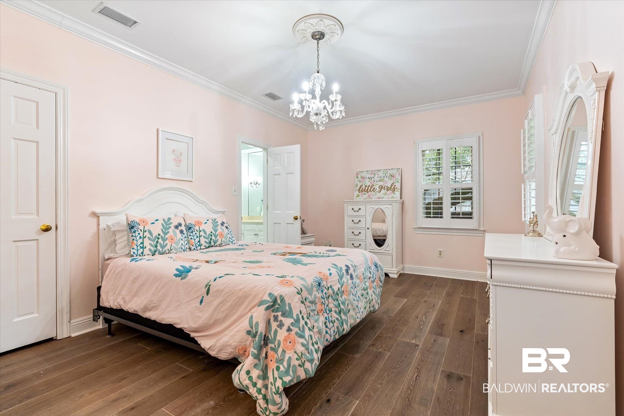 5324 Oak Bend Court Mobile, AL 36609 - Photo 29 of 49 Bedroom featuring ornamental molding, visible vents, an inviting chandelier, and dark wood finished floors
