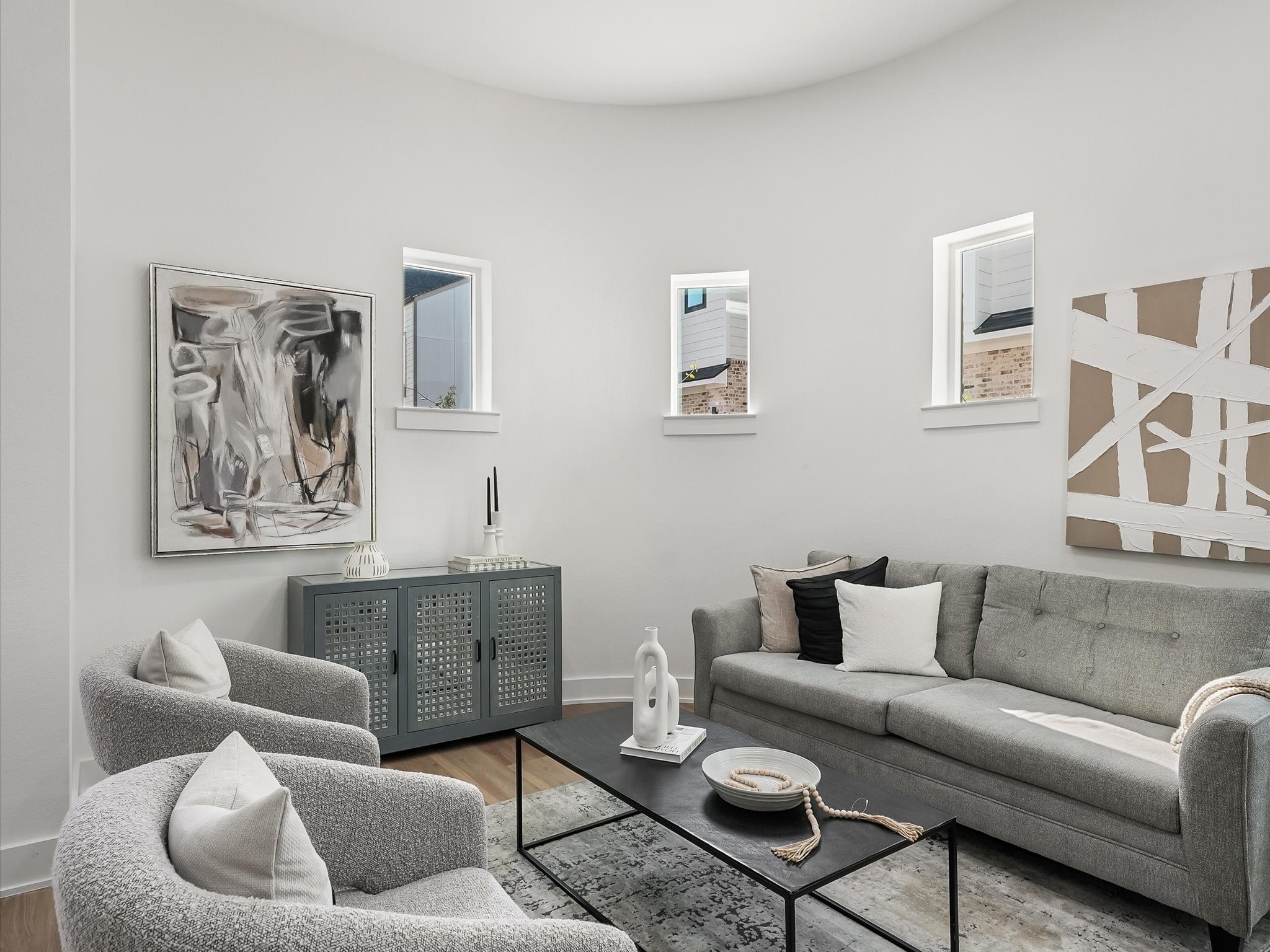 2598 West Tidwell Road Houston, TX 77091 - Photo 12 of 37 a living room with furniture and a couch