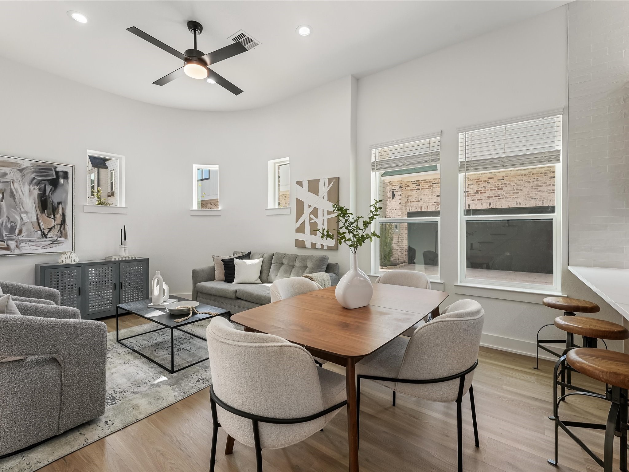 2598 West Tidwell Road Houston, TX 77091 - Photo 15 of 37 a living room with furniture and a large window