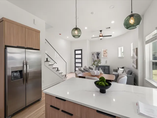 a view of a living room and dining room