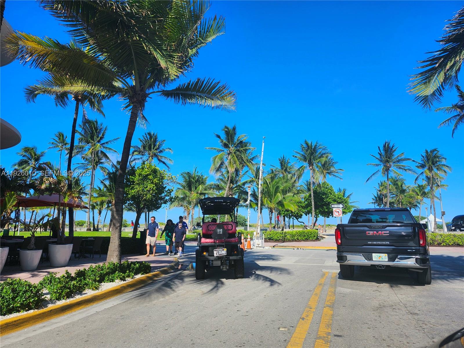 1666 West Avenue, Unit 312 Miami Beach, FL 33139 - Photo 18 of 42 a car parked on the side of the road