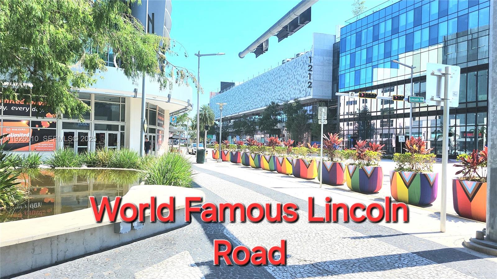 1666 West Avenue, Unit 312 Miami Beach, FL 33139 - Photo 27 of 42 a front view of multi story residential apartment building with retail shops