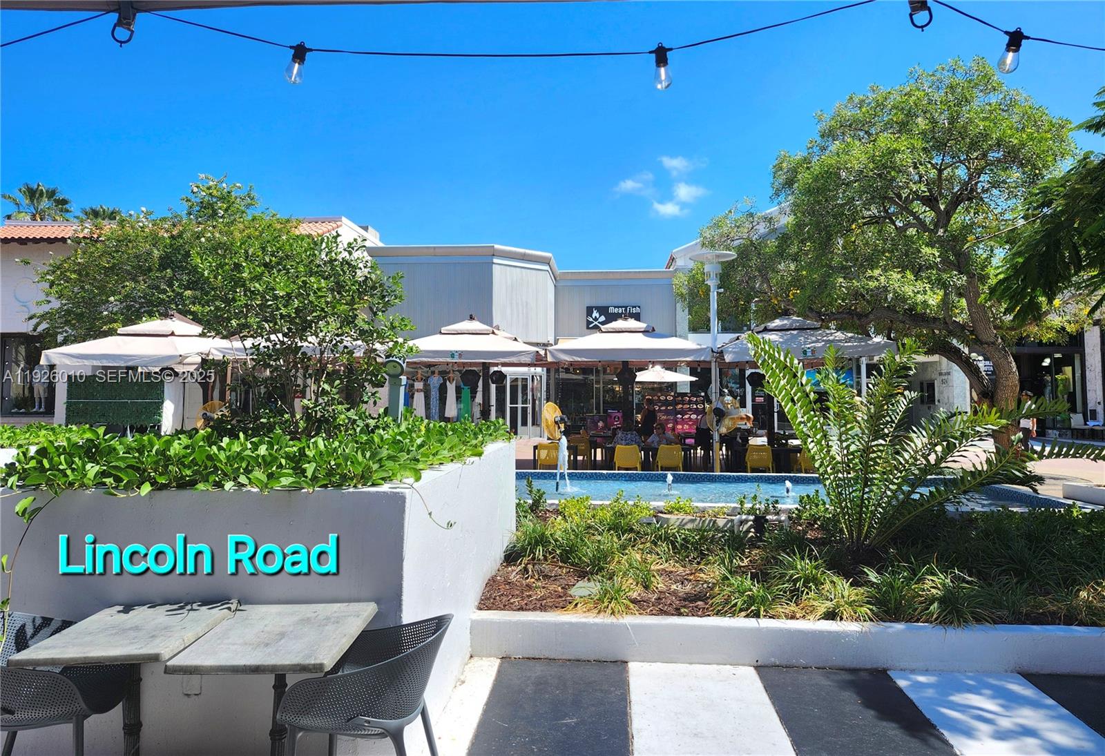 1666 West Avenue, Unit 312 Miami Beach, FL 33139 - Photo 30 of 42 a view of a chairs and table in a patio