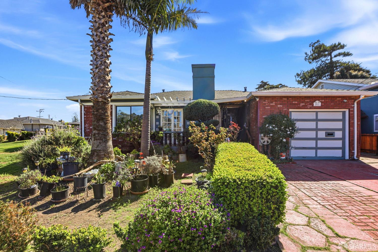 511 87th Street Daly City, CA 94015 - Photo 1 of 1 a view of a potted plants in front of house