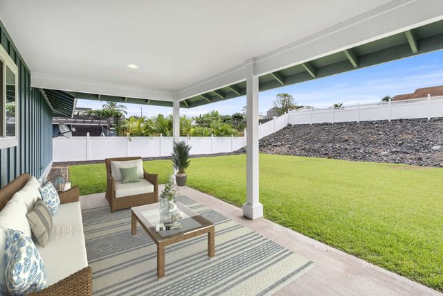 a view of a patio with table and chairs potted plants with wooden floor