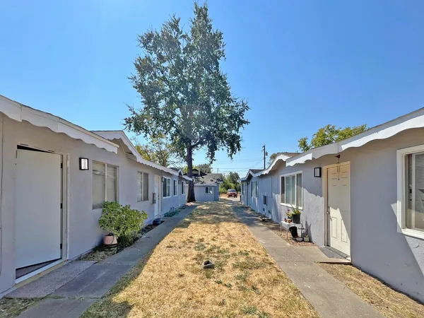a house with garden in front of it
