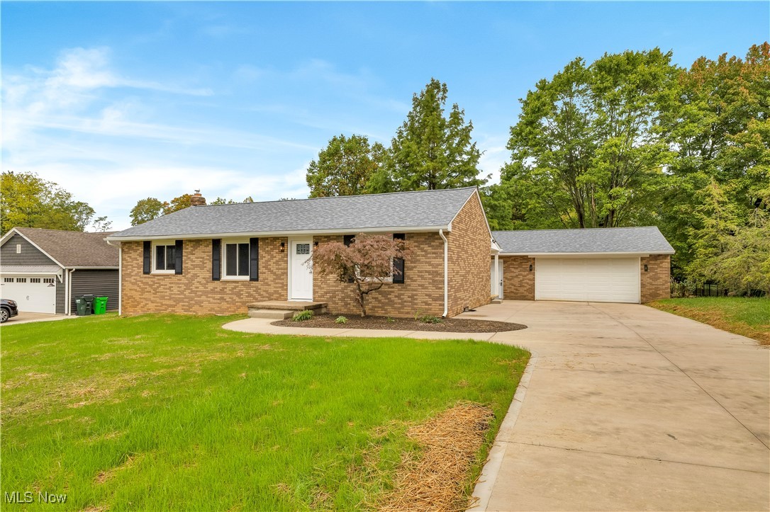 3071 Call Road Stow, OH 44224 - Photo 1 of 25 View of front of property with a front lawn and a garage