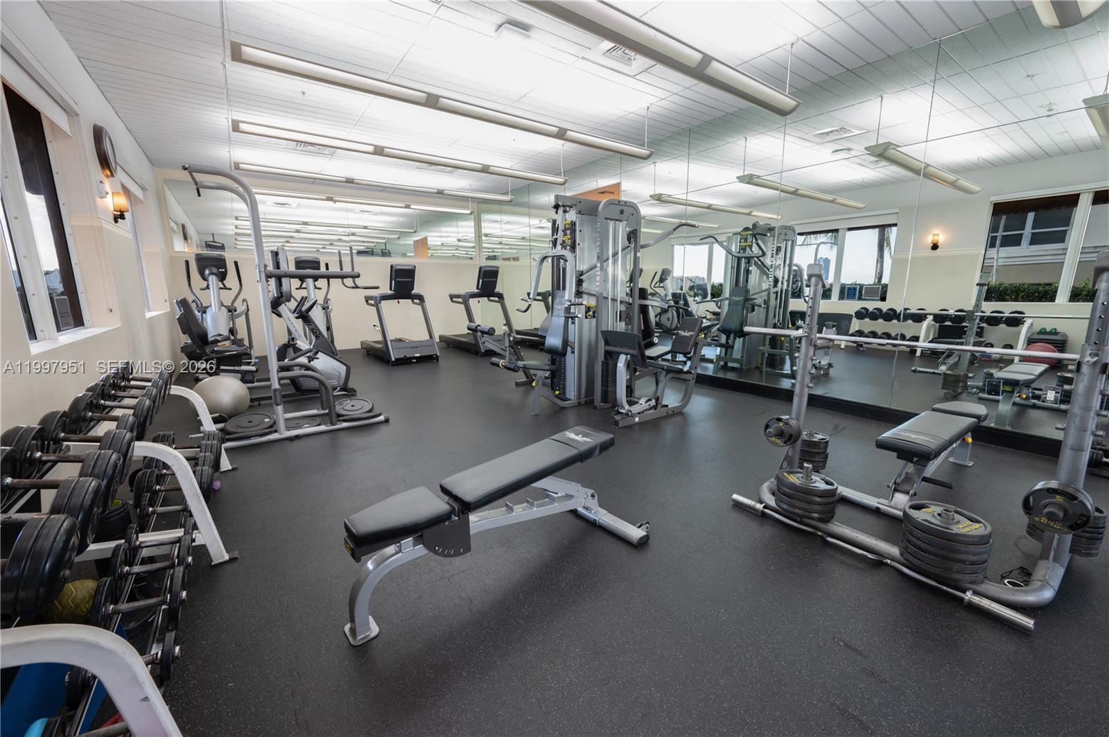 3232 Southwest 22nd Terrace, Unit 607 Miami, FL 33145 - Photo 15 of 20 a gym room with lots of gym equipment