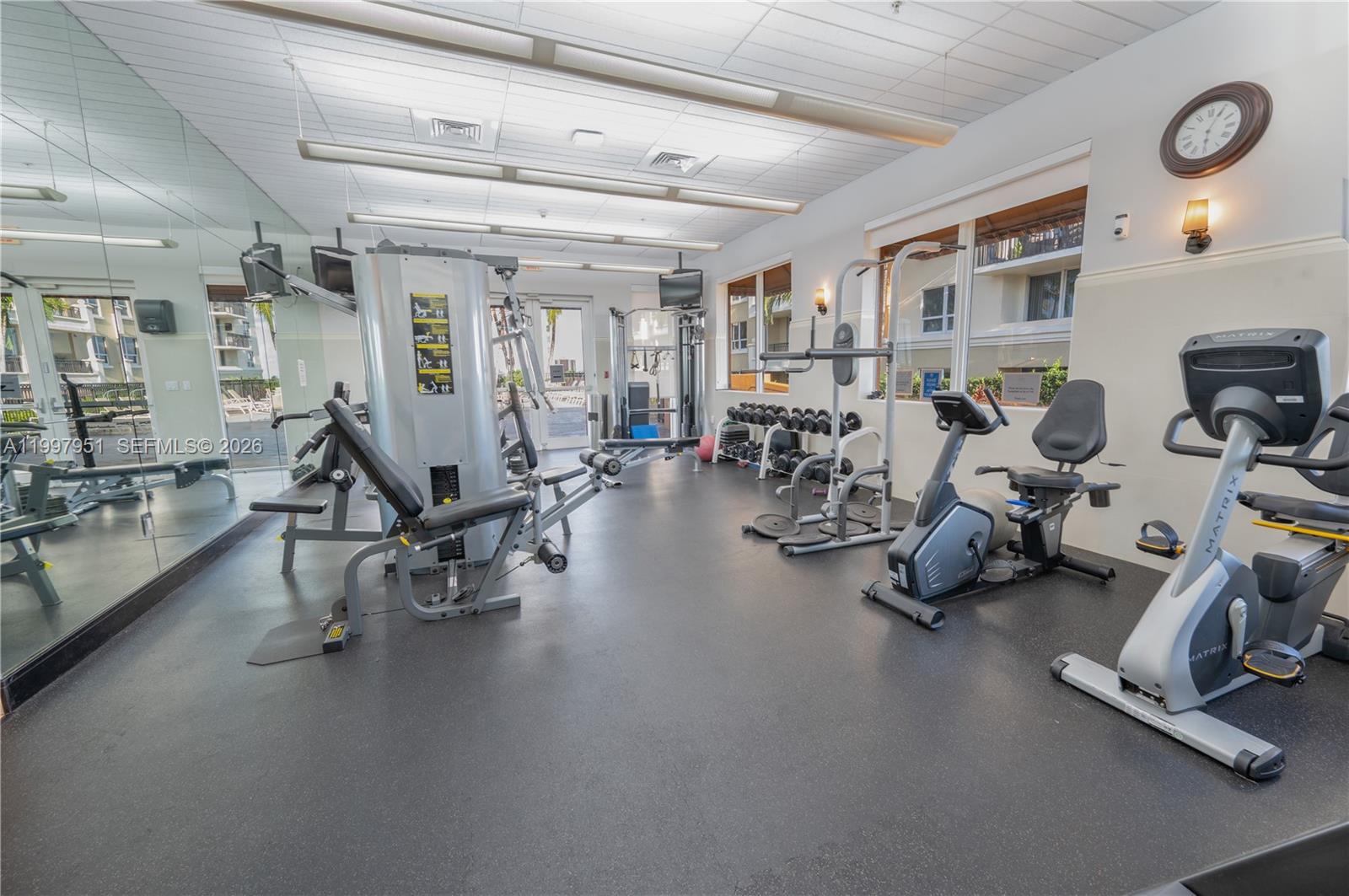 3232 Southwest 22nd Terrace, Unit 607 Miami, FL 33145 - Photo 16 of 20 a view of a room with gym equipment