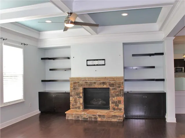 a kitchen with a sink and a refrigerator