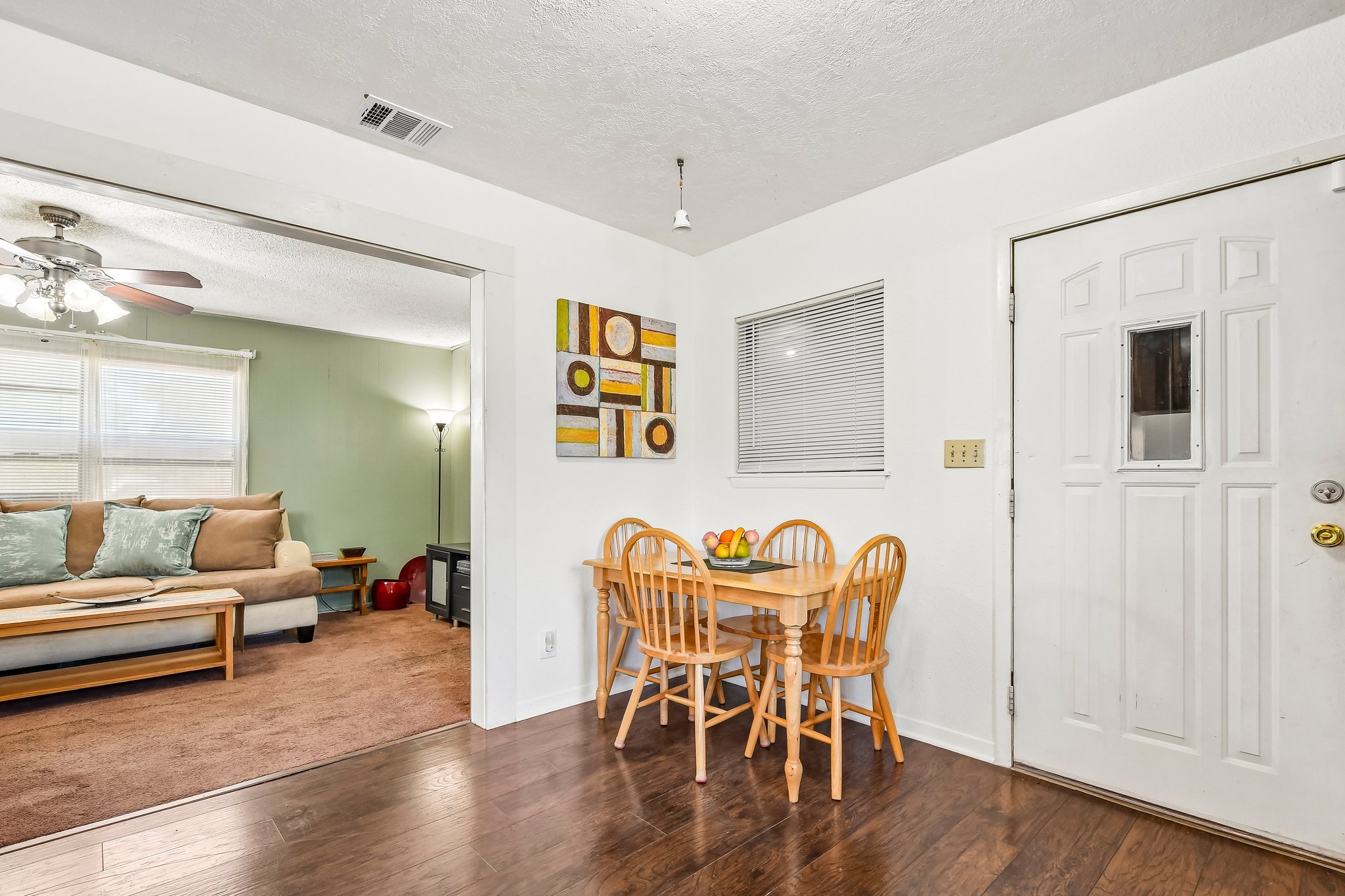 101 Brown Street Elgin, TX 78621 - Photo 13 of 32 a dining room with furniture and wooden floor