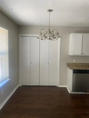 a view of a small space with a fan