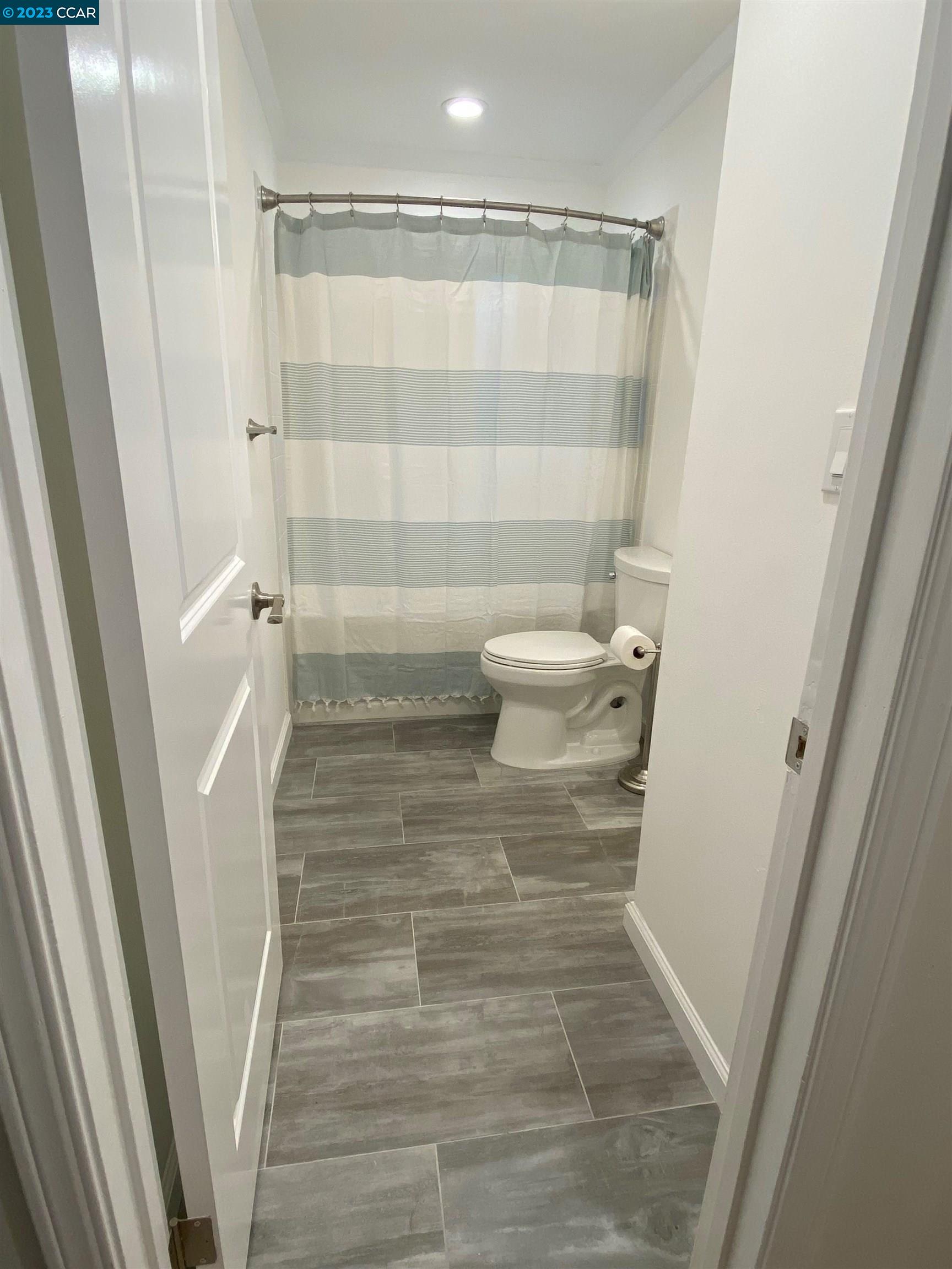 959 Duar Drive Concord, CA 94518 - Photo 7 of 14 a bathroom with a sink and a shower