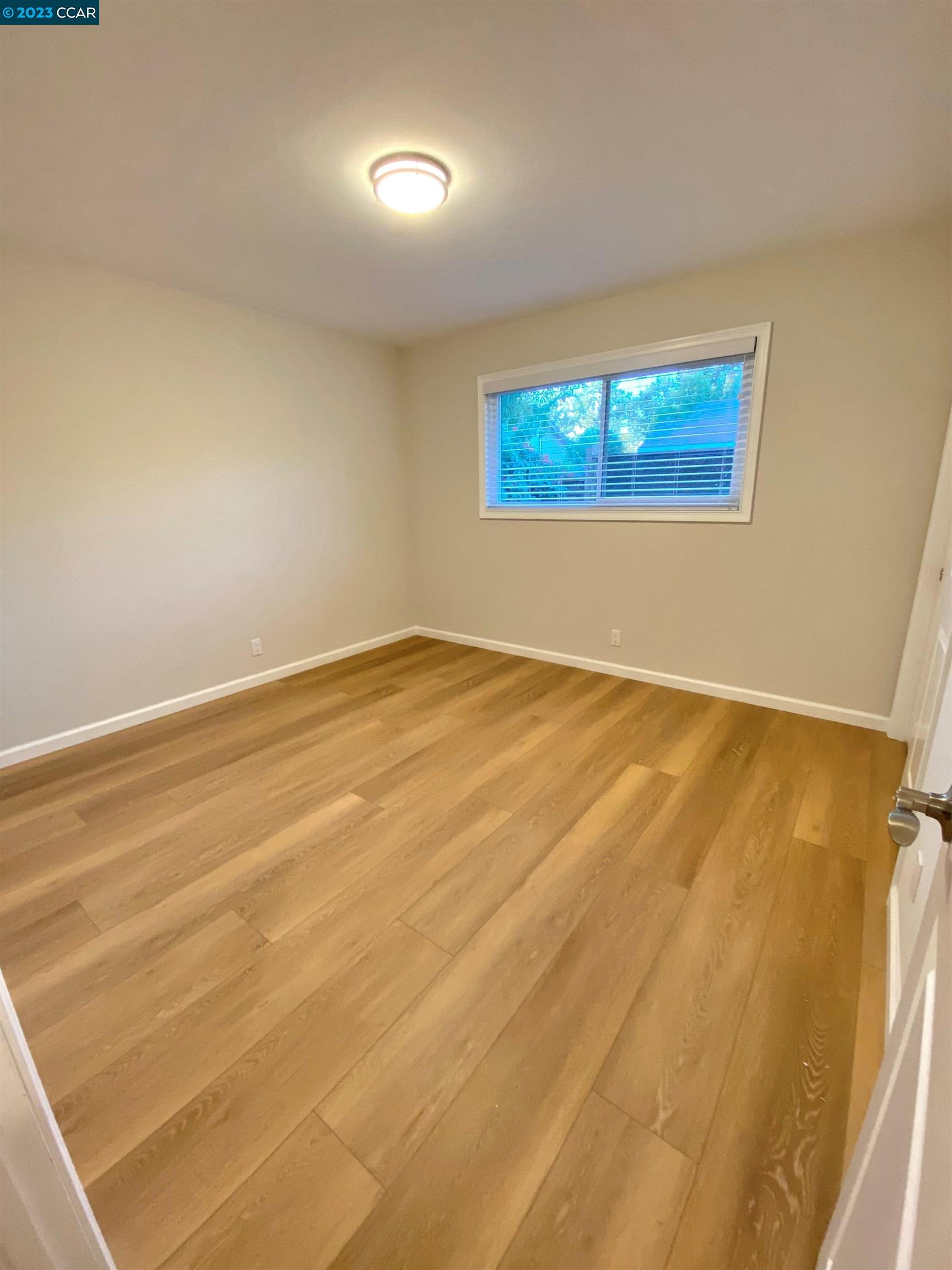 959 Duar Drive Concord, CA 94518 - Photo 9 of 14 an empty room with a window