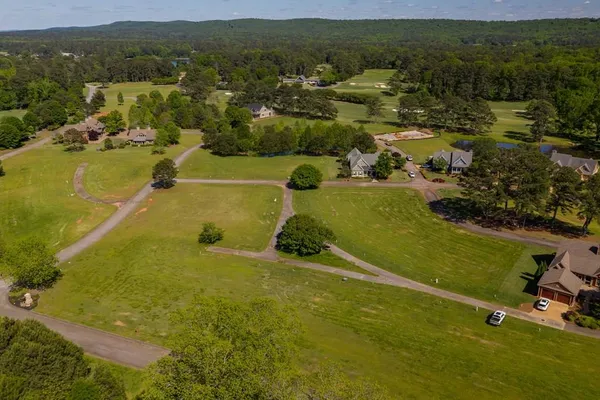 a view of a lake with a city