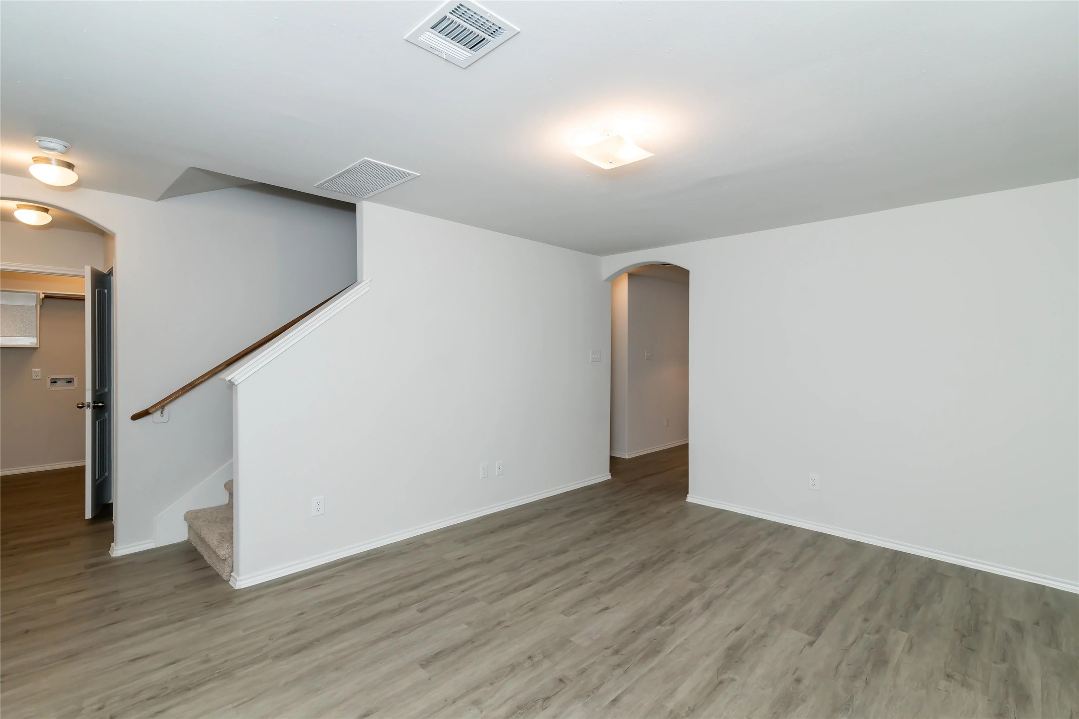 22406 Porter Mountain Trail Porter, TX 77365 - Photo 5 of 11 a view of an empty room with wooden floor