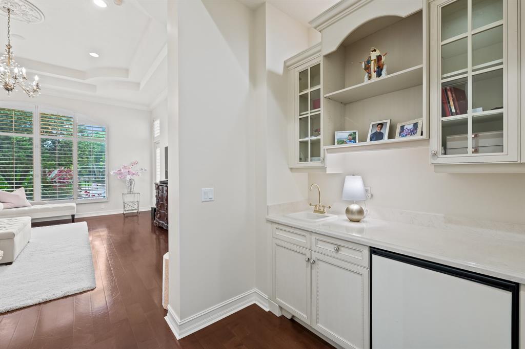 12794 Stonebrook Drive Davie, FL 33330 - Photo 24 of 45 a view of a kitchen cabinets and wooden floor
