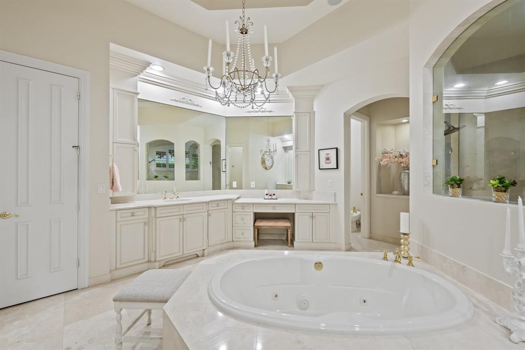 12794 Stonebrook Drive Davie, FL 33330 - Photo 26 of 45 a bathroom with a tub sink and mirror