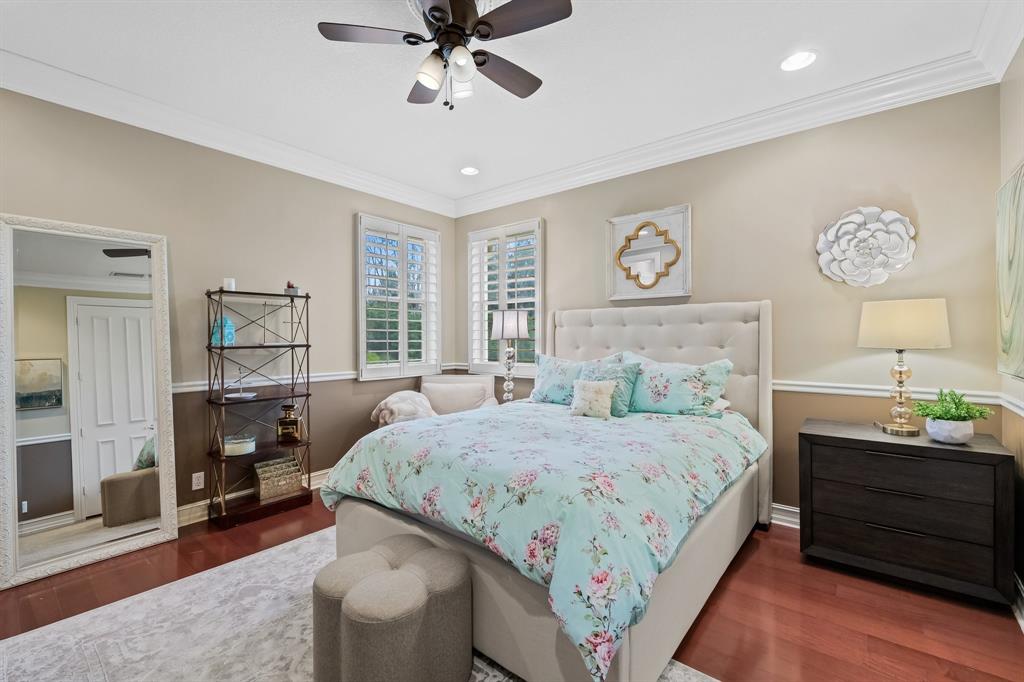 12794 Stonebrook Drive Davie, FL 33330 - Photo 32 of 45 a bedroom with a bed and wooden floor