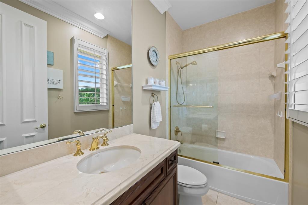 12794 Stonebrook Drive Davie, FL 33330 - Photo 34 of 45 a bathroom with a sink toilet and shower
