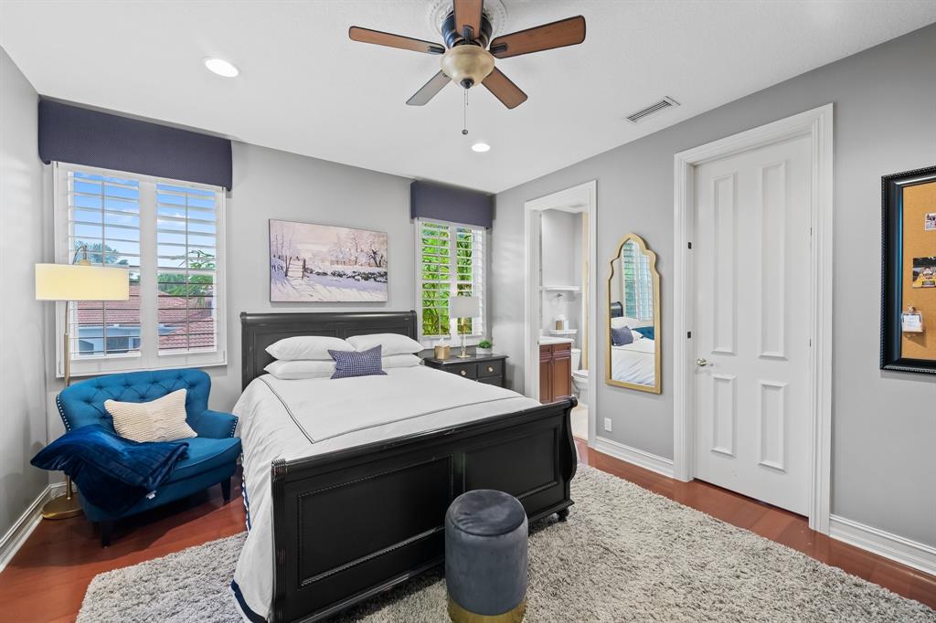 12794 Stonebrook Drive Davie, FL 33330 - Photo 35 of 45 a living room with furniture a rug and white walls