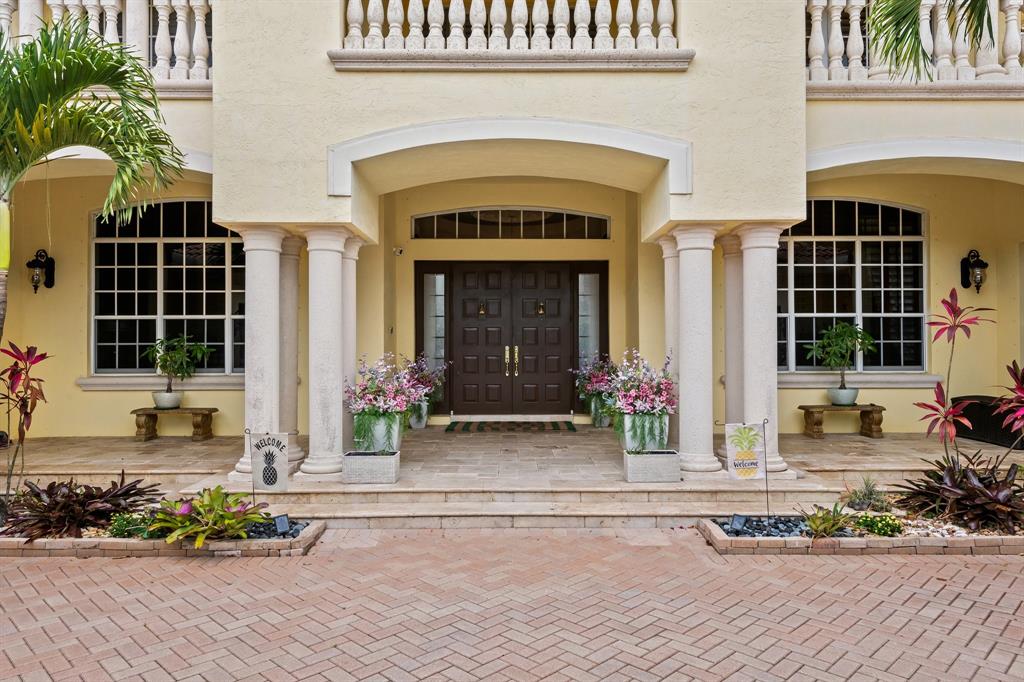 12794 Stonebrook Drive Davie, FL 33330 - Photo 4 of 45 a front view of a house with a yard
