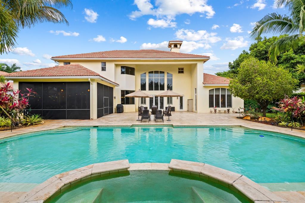 12794 Stonebrook Drive Davie, FL 33330 - Photo 5 of 45 a view of a house with a swimming pool