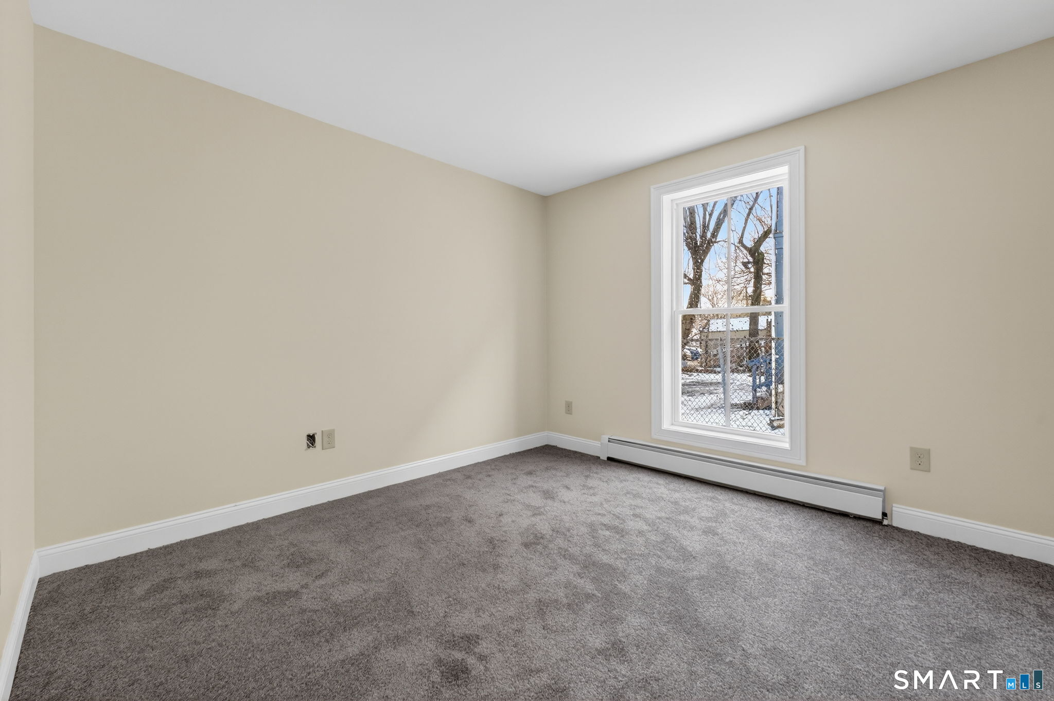 570 Zion Street Hartford, CT 06106 - Photo 17 of 40 an empty room with windows