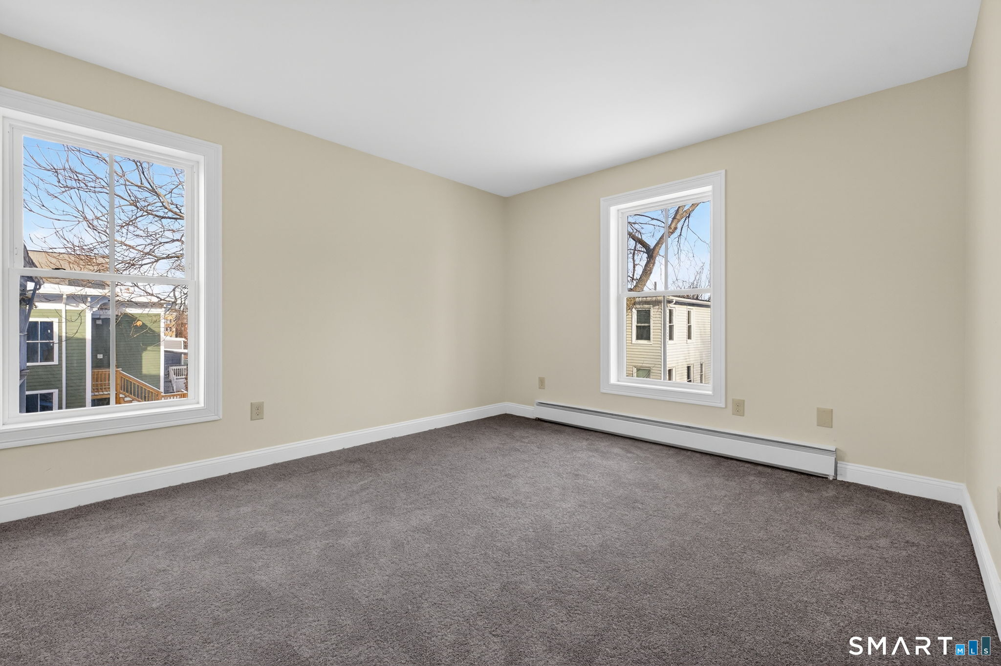 570 Zion Street Hartford, CT 06106 - Photo 25 of 40 an empty room with windows