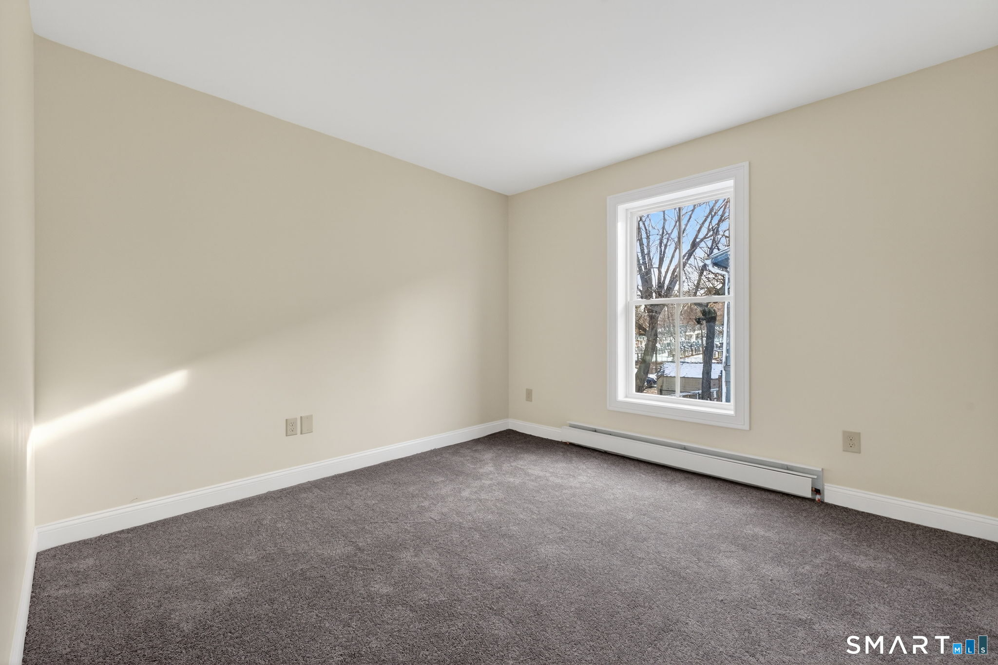 570 Zion Street Hartford, CT 06106 - Photo 31 of 40 an empty room with windows
