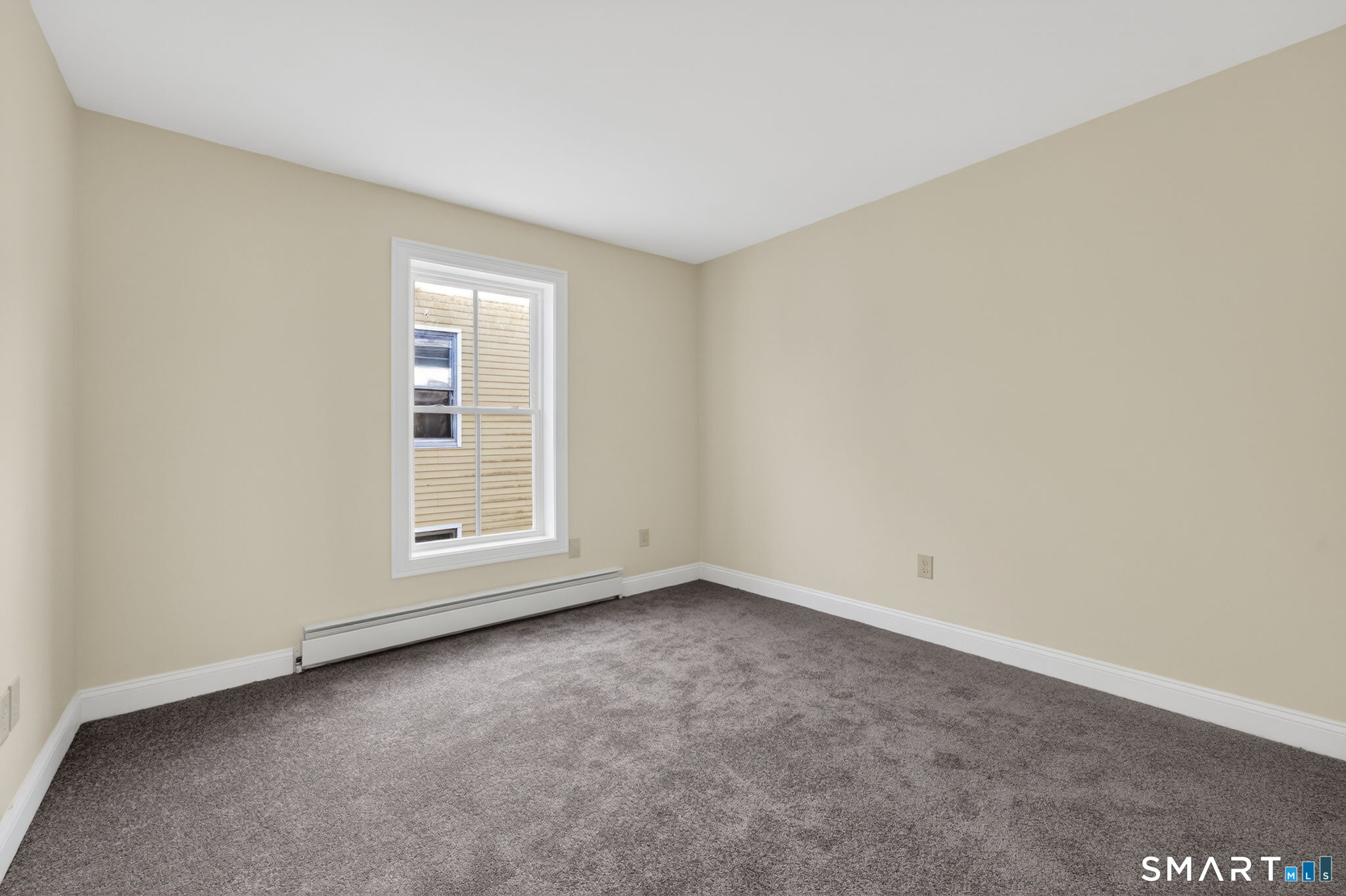 570 Zion Street Hartford, CT 06106 - Photo 34 of 40 an empty room with a window