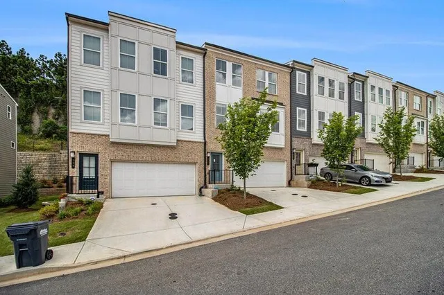 a front view of building with yard