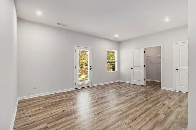 an empty room with windows