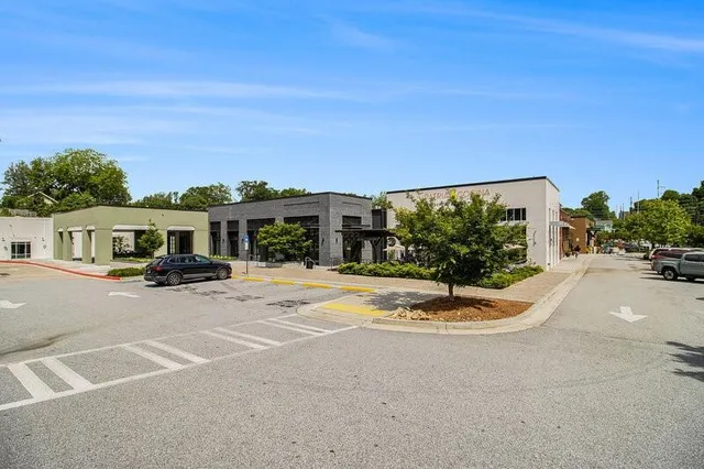 a view of parked car with city street