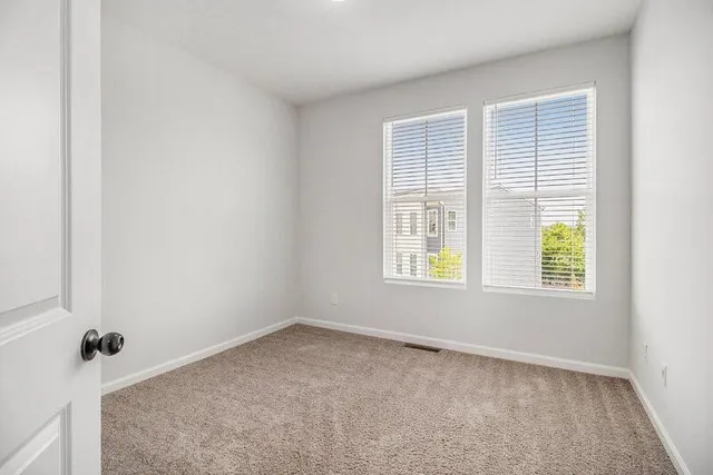 an empty room with a window