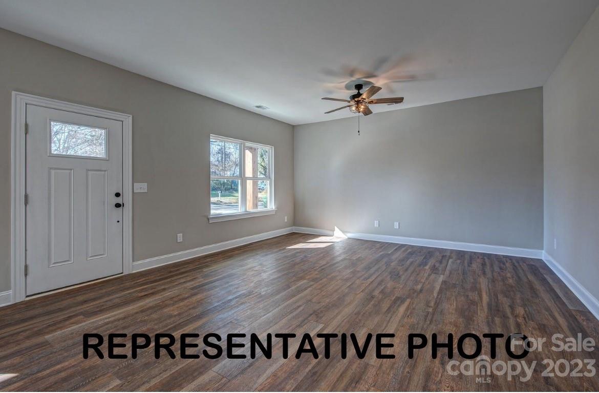 529 Blacksnake Road Stanley, NC 28164 - Photo 9 of 16 wooden floor in an empty room